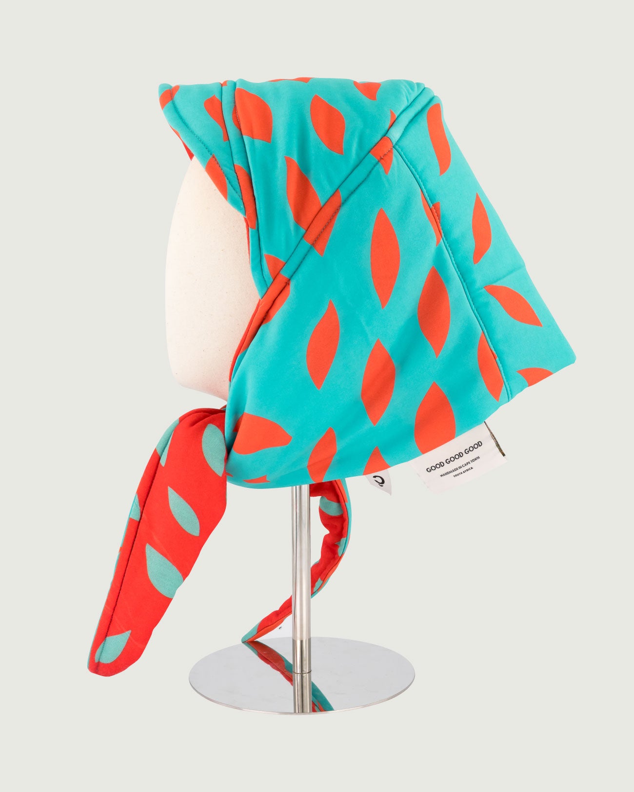 CB x GGG Puffer Kappie, GGG Printed Fabric, Teal / Orange
